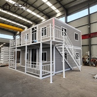 Maisons conteneurs extensibles OCM de 20 pieds, panneaux sandwich isolés robustes, installation rapide, étanches, modulaires, pour camp de travail, hôtel de villégiature