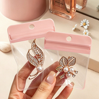 Sachets Ziplock en EVA rose avec trou de suspension, prêts à l'emploi, réutilisables et auto-scellants pour le rangement des boucles d'oreilles, colliers et bagues