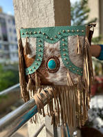 Sac à bandoulière en cuir de fourrure de style occidental unique pour femmes sac latéral de style vintage en cuir de fourrure usiné de couleur en relief