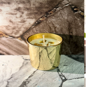 A <b>large</b> cylindrical brass <b>candle</b> with a wax fill and a simple crest logo. - Product Image 4