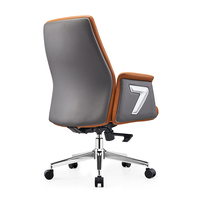 Fauteuil de bureau ergonomique en cuir PU orange à mécanisme fonctionnel avec roulettes