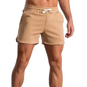 Vente en gros de shorts de gym 100% coton avec logo personnalisé ODM personnalisés pour hommes shorts de gym décontractés à motif uni teints - Product Image 1