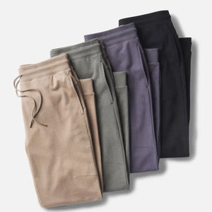 Nouveauté Pantalons de survêtement pour hommes Streetwear avec poches à cordon en tissu toile Séchage rapide et respirant Style décontracté - Product Image 1