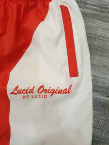 Ensemble de survêtement coupe-vent personnalisé 100% polyester de haute qualité pour hommes en nylon respirant coupe décontractée été court design tricoté - Product Image 5