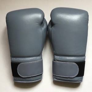 Guantes de boxeo profesionales transpirables, impermeables y ligeros de primera calidad para entrenamiento con logotipo personalizado 2017 - Product Image 1