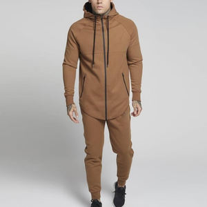 Sudadera con capucha de color beige con cremallera negra Material transpirable Disponible en varios colores - Product Image 1