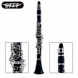 <span class=keywords><strong>Clarinete</strong></span> Profesional <span class=keywords><strong>de</strong></span> 26 Llaves en Sib, Sistema Alemán, <span class=keywords><strong>Instrumento</strong></span> <span class=keywords><strong>de</strong></span> Viento <span class=keywords><strong>de</strong></span> Madera, Venta al por Mayor <span class=keywords><strong>de</strong></span> Fábrica OEM&ODM para Orquestas y Bandas - Product Image 1
