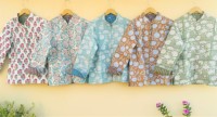Veste réversible matelassée en pur coton imprimé floral pour femme, style bohème vintage avec col montant et fermeture boutonnée, idéale pour l'hiver