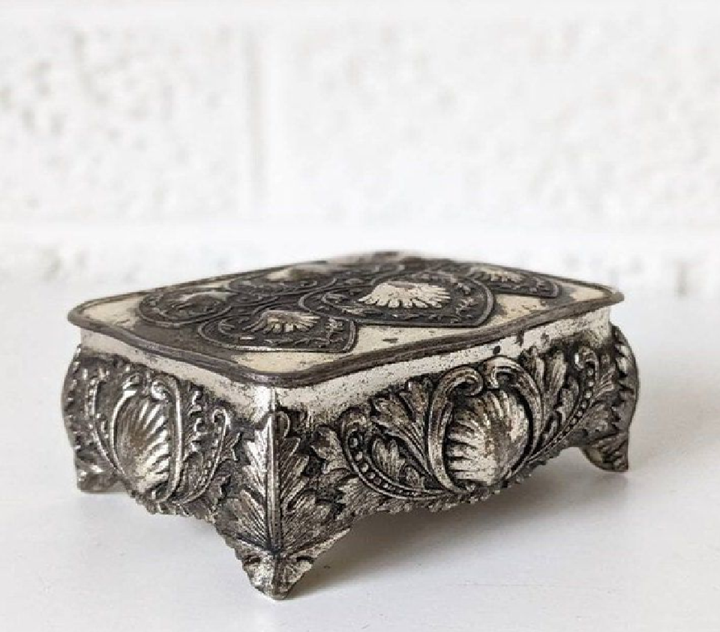 Classic sterling silver jewelry box, elegantly embossed with roses, a timeless piece, footed, available at wholesale prices.