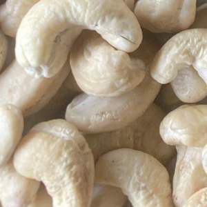 Fabrication du Vietnam Noix de cajou brutes Noix de cajou brutes W180 Prix Vente en gros de noix de cajou entières exportées vers l'Asie, l'UE, le Moyen-Orient - Product Image 1