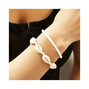 CHAUDE CHAUDE 2024 BRACELET DE COQUILLE DE MER STYLE BOHÉMIEN PRIX BON MARCHÉ ÉTÉ VIBE COQUILLE DE MER NATUREL TRESSÉ LE MOINS CHER BRACELET DE COQUILLE DE MER - Product Image 1