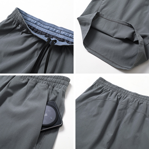 Short athlétique d'entraînement à séchage rapide pour hommes avec poches motif solide pour la course à pied décontractée Gym Basketball-Polyester et Spandex - Product Image 2