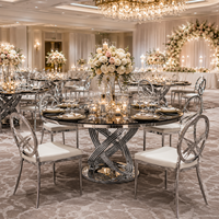 Table ronde de luxe en acier inoxydable argenté pour hôtel, idéale pour les événements et les fêtes