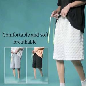 กางเกงขาสั้นกีฬาผู้ชายผ้าแคนวาสผสมโพลีเอสเตอร์ 100% ทรงปกติ เอวยางยืด มีกระเป๋า ระบายอากาศได้ดี กันน้ำ สไตล์ไฮสตรีท - Product Image 6