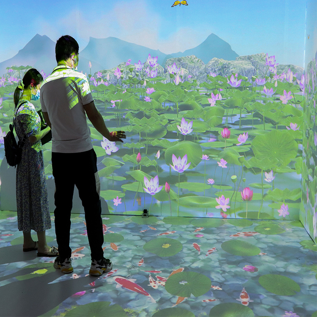 Customized Advanced Immersive Projection Room System with Motion Capture Radar Sensor for Interactive Digital Experience