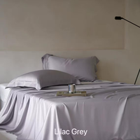 Vente en gros de draps de lit de luxe en lyocell personnalisés multi-tailles en fibre de bambou de couleur ensemble de literie d'hôtel à texture soie écologique