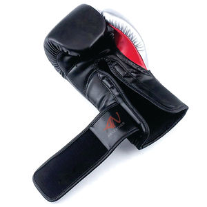 นวมชกมวยไทยคุณภาพสูง ปักโลโก้ได้ตามต้องการ สำหรับฝึกซ้อมและแข่งขัน ระบายอากาศได้ดี บุผ้าฝ้าย ผลิตจากหนังวัวแท้ - Product Image 4