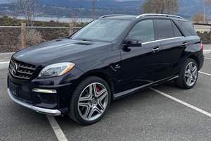 Mercedes-Benz ML63 AMG 2012 d'occasion, 550 ch, V8 biturbo, transmission intégrale, pack performance P30 AMG, non modifié - Product Image 2