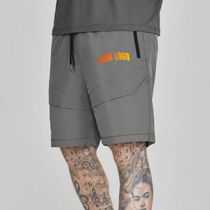 Nouveau short personnalisé pour hommes couleur unie avec poches zippées logo sérigraphié personnalisé short léger à séchage rapide pour hommes - Product Image 1