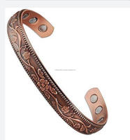Bracelets ronds magnétiques dorés polis de haute qualité, imprimés en sérigraphie, artisanat métallique moderne et d'art, vente en gros
