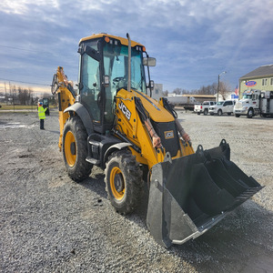 รถตักล้อยาง JCB รุ่น 3CX-14 Plus สีเหลือง เครื่องยนต์ดีเซล พร้อมบุ้งกี๋และชิ้นส่วนหลักของเครื่องยนต์ - Product Image 1