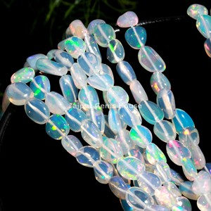 Perles de pépites d'opale éthiopienne naturelle de forme ovale lisse blanche pour la fabrication de bijoux à la mode perles de pierres précieuses - Product Image 6