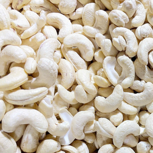 Fabrication Ww180 Ww320 Prix de gros de noix de cajou brutes Santigo au Vietnam Vente en gros exporté vers l'Asie, l'UE, le Moyen-Orient - Product Image 1