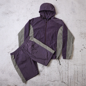 Fabricants personnalisés de survêtements coupe-vent à blocs de couleurs ensemble de survêtements de sport coupe-vent en nylon tissé de haute qualité - Product Image 1