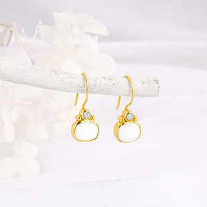 Boucles d'oreilles pendantes de luxe en zircon doré - Product Image 1