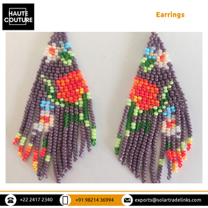 Grand fabricant indien largement vendu meilleure qualité style classique fait à la main fleur hawaïenne perlée magenta glands boucles d'oreilles - Product Image 5