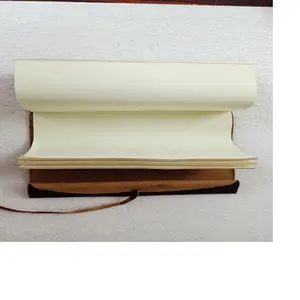 custom made ivory colored cotton rag handmade papers in 125 GSM for book makers and book binders for making journals