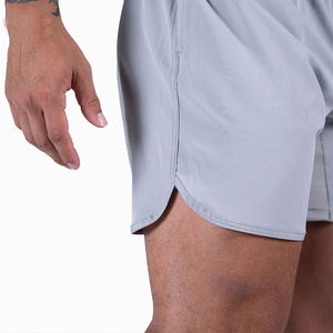 Pantalones cortos de entrenamiento para correr de compresión con logotipo personalizado Pantalones deportivos de gimnasio de secado rápido para hombres High Street Style Servicio OEM sólido disponible - Product Image 2