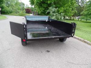 รถพ่วงดั๊มพ์ CAM ยี่ห้อ Superline ขนาด 6 x 10 ฟุต สำหรับงานฟาร์ม พร้อมมอเตอร์ม้วนผ้าใบคลุม  อะไหล่เกียร์  ความปลอดภัยสูง  น้ำหนักบรรทุกสุทธิ 11960 ปอนด์  ความเร็วสูงสุด 150 กม./ชม. - Product Image 5