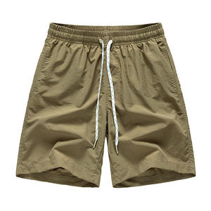 Vente en gros de shorts d'été décontractés de qualité supérieure pour la plage à séchage rapide en plein air shorts baggy en polyester à cordon unisexes très vendus - Product Image 1