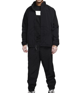 Vente en gros 2025 OEM sans logo personnalisé décoration broderie survêtements respirants ensemble coupe-vent en nylon pour hommes - Product Image 1