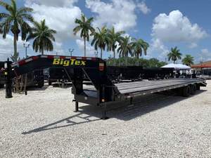 Semi-remorque à plateau plat à 3 essieux robuste, plateau en acier de 40 pieds avec capacité de charge de 2 à 3 tonnes, vente de remorques de fret et utilitaires fabriquées en - Product Image 4