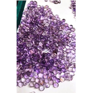 พลอยอะเมทิสต์ทรงหลังเบี้ยสีฟ้าธรรมชาติขนาด8x6มม. ถึง14x14มม. 2460ชิ้นทรงวงรีทรง5040cts - Product Image 1