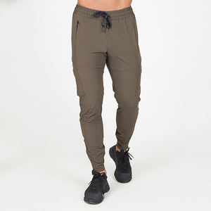 กางเกงวิ่งออกกำลังกายผู้ชาย ผ้ากันลม สำหรับกิจกรรมกลางแจ้ง ฟิตเนส วิ่ง ขายส่ง รับผลิตตามแบบ - Product Image 1