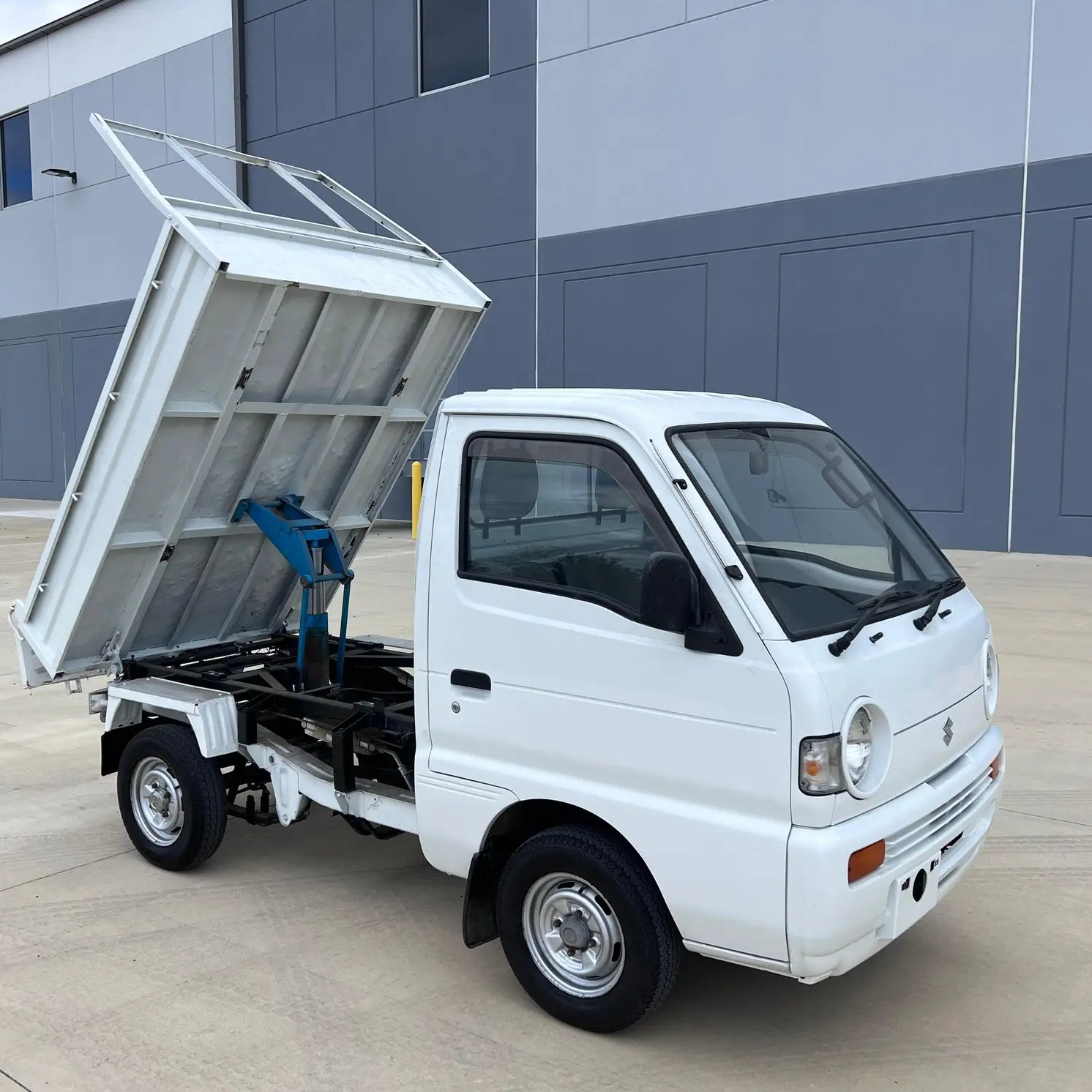 1991 Suzukis usato per il trasporto di autocarro con cassone ribaltabile 4x4 a 4 marce manuale, aria condizionata, 4WD