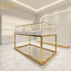 Comptoir de magasin de bijoux de luxe moderne, design en acier inoxydable doré, <span class=keywords><strong>vitrine</strong></span> de présentation de bijoux en verre avec éclairage LED - Product Image 1