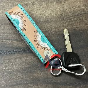 พวงกุญแจกระเป๋าหนังวัวเครื่องมือทำมือเป็นของขวัญโปรโมชั่นล่าสุดของ2025พวงกุญแจห้อยข้อมือดีไซน์ทันสมัยสำหรับทุกเพศ - Product Image 1