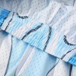 กางเกงขาสั้นผ้าตาข่ายระดับพรีเมี่ยมสำหรับผู้ชายกางเกงขาสั้นชายหาดเอวแห้งเร็วระบายอากาศได้ดีพิมพ์ซับลิเมชันตามสั่ง - Product Image 5