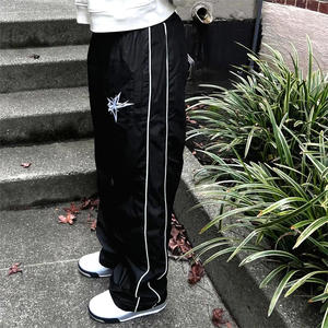 กางเกงกันลมไนลอนออกแบบได้ตามต้องการสำหรับผู้หญิงกางเกงวอร์มผ้าเย็บปะติดด้านข้างกางเกงไนลอนน้ำหนักเบา - Product Image 1