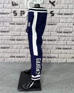 Directo de fábrica personalizado OEM 100% algodón Jogger pantalones botón decoración acanalado plano moda Casual deportes al aire libre pantalones de rayas laterales - Product Image 4