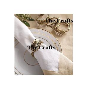 Ensemble de ronds à serviette en aluminium couleur or avec quatre feuilles porte-serviettes pour la maison, l'hôtel et le mariage. - Product Image 1