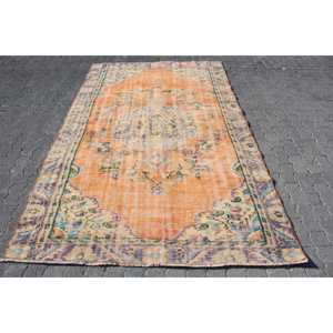 Tapis vintage 5,7 x 9,4 pieds, grand tapis turc, tapis à imprimé animalier orange - Product Image 1