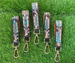 พวงกุญแจหนังแบบหนีบกุญแจแบบใหม่พวงกุญแจหนังแบบตะวันตกพวงกุญแจขนนกพวงกุญแจหนังแบบกำหนดเองพวงกุญแจคาวเกิร์ลพวงกุญแจแบบปรับแต่งได้ - Product Image 2