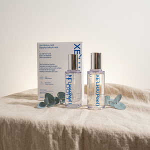 1. XE LHA เฟเชียล พีลลิ่ง ลิควิด เอ็กซ์โฟลิเอเตอร์ สำหรับทุกสภาพผิว - Product Image 1