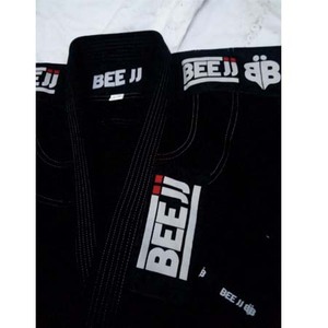 ALTA CALIDAD KARATE GI UNIFORME GI KARATE VENTA CALIENTE EQUIPO DE ENTRENAMIENTO PESO LIGERO TRAJES DE ARTES MARCIALES BLANCO 12OZ - Product Image 5