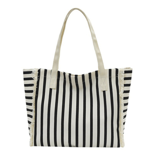 Bolso de mano grande de lona de algodón con flecos para mujer personalizado con patrón de rayas en Blanco y Negro Bolso de algodón con estampado de letras - Product Image 1